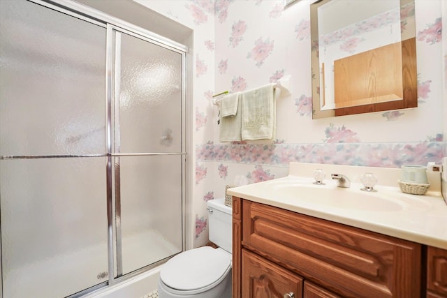 15138 S 75th Ct Unit 0, Orland Park, IL 60462 - bathroom featuring wallpapered walls, vanity, and a stall shower