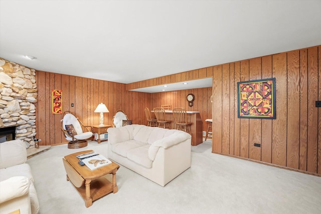 15138 S 75th Ct Unit 0, Orland Park, IL 60462 - living room with bar, carpet flooring, wood walls, and a fireplace