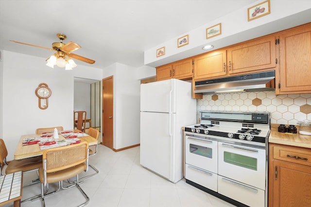 15138 S 75th Ct Unit 0, Orland Park, IL 60462 - kitchen with under cabinet range hood, white appliances, tasteful backsplash, light countertops, and ceiling fan