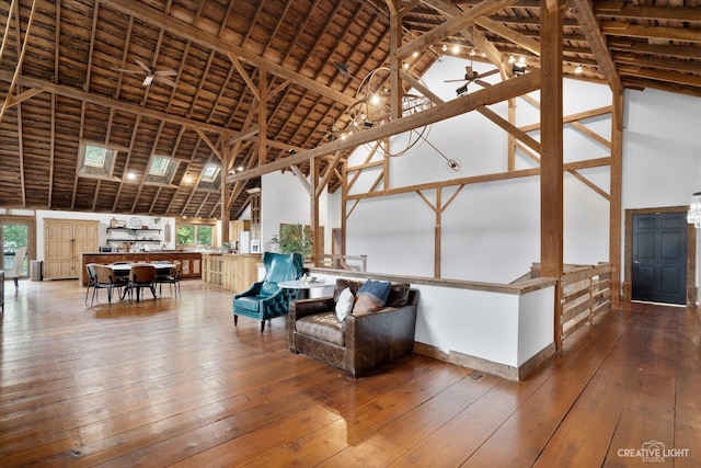 51 Chippewa Dr, Oswego, IL 60543 - living area featuring high vaulted ceiling, wood-type flooring, ceiling fan, and a wood ceiling with exposed beams