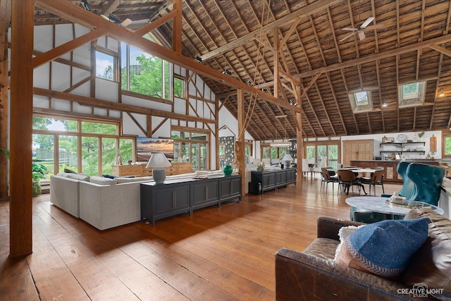 51 Chippewa Dr, Oswego, IL 60543 - living room with high vaulted ceiling and wood-type flooring