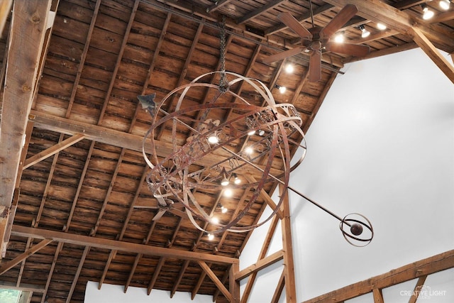 51 Chippewa Dr, Oswego, IL 60543 - detailed view of a ceiling fan, a wooden ceiling with exposed beams, and a chandelier