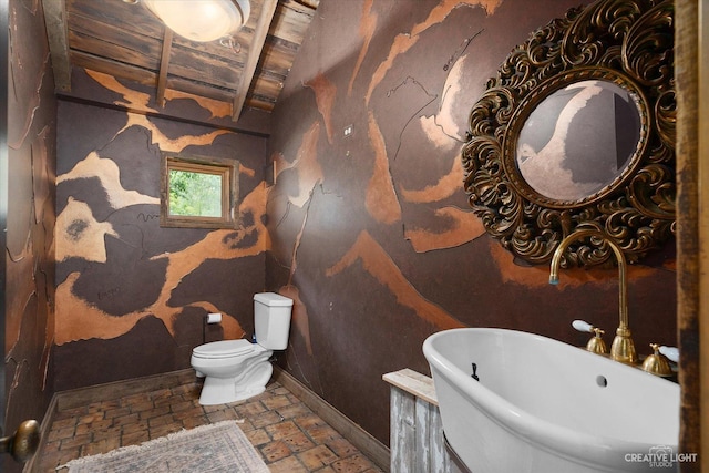 51 Chippewa Dr, Oswego, IL 60543 - bathroom featuring stone tile floors and a wood ceiling with exposed beams