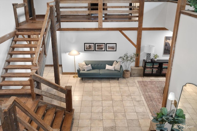 51 Chippewa Dr, Oswego, IL 60543 - living area featuring stairway