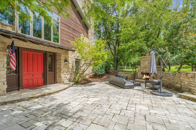 51 Chippewa Dr, Oswego, IL 60543 - view of patio / terrace featuring an outdoor living space with a fireplace