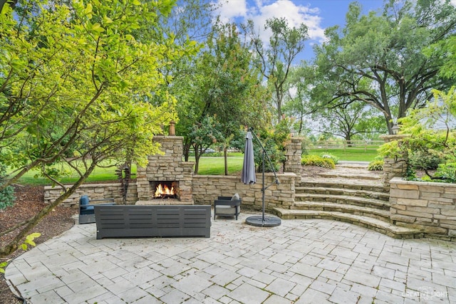 51 Chippewa Dr, Oswego, IL 60543 - view of patio featuring an outdoor living space with a fireplace