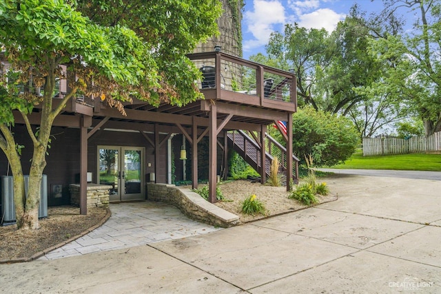 51 Chippewa Dr, Oswego, IL 60543 - exterior space with a wooden deck and french doors