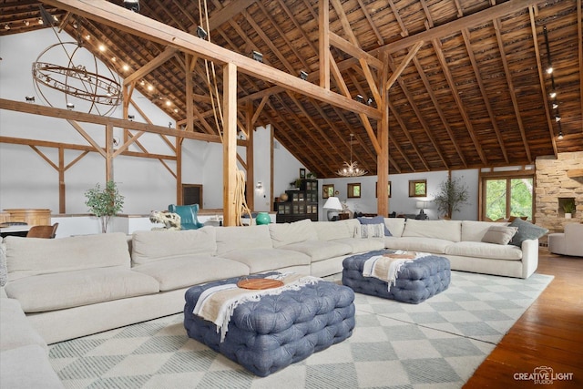 51 Chippewa Dr, Oswego, IL 60543 - living area with a chandelier, wood finished floors, and high vaulted ceiling