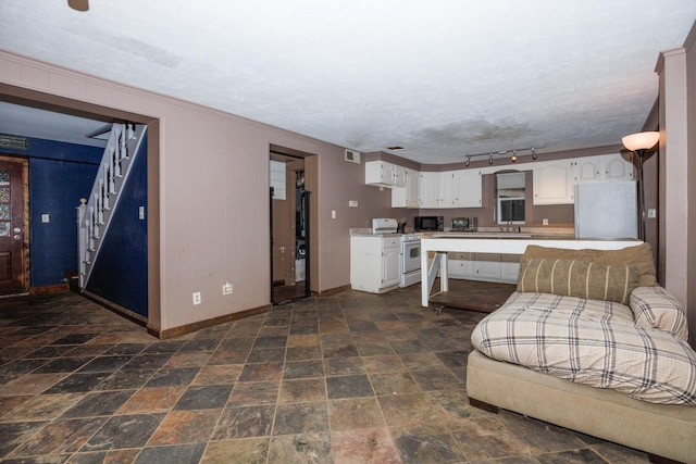 17366 Walden Rd, Hudson, IL 61748 - living area with stairway and dark stone finish floors