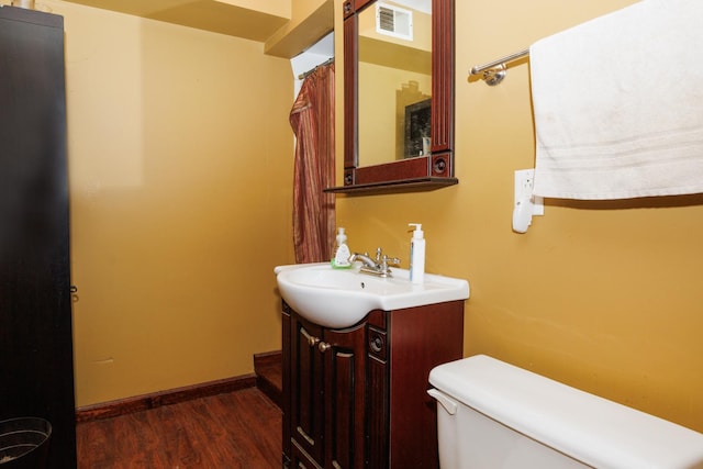 17366 Walden Rd, Hudson, IL 61748 - bathroom with vanity and wood finished floors