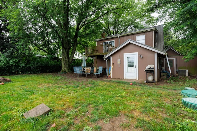 17366 Walden Rd, Hudson, IL 61748 - view of grassy yard with a shed and a deck