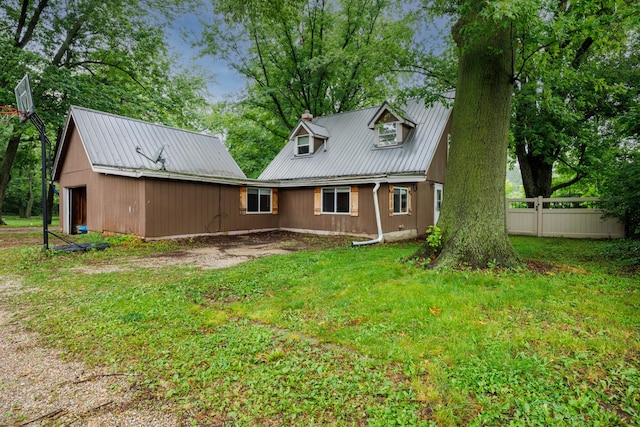 17366 Walden Rd, Hudson, IL 61748 - rear view of property featuring a metal roof