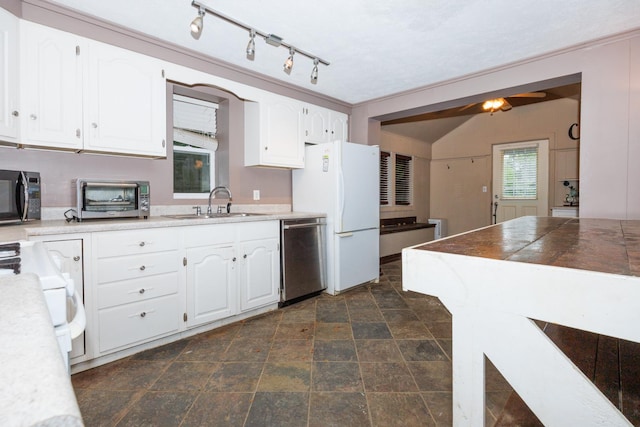 17366 Walden Rd, Hudson, IL 61748 - kitchen with black microwave, dishwasher, freestanding refrigerator, range, and white cabinets