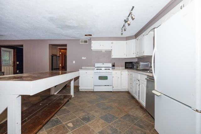 17366 Walden Rd, Hudson, IL 61748 - kitchen with white appliances, white cabinetry, dark stone finish floors, and light countertops
