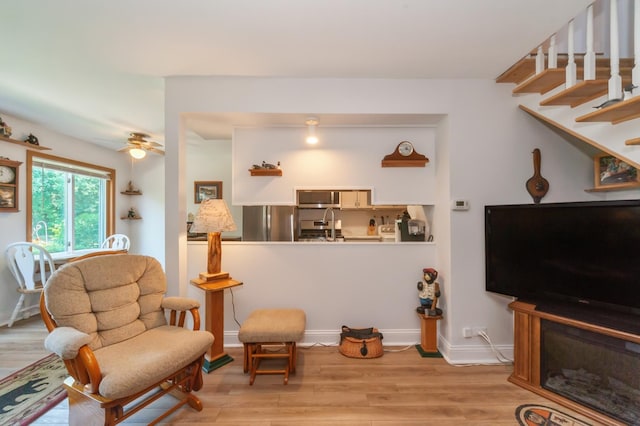 1232 Cove Dr, Prospect Heights, IL 60070 - living room with light wood-style flooring and ceiling fan