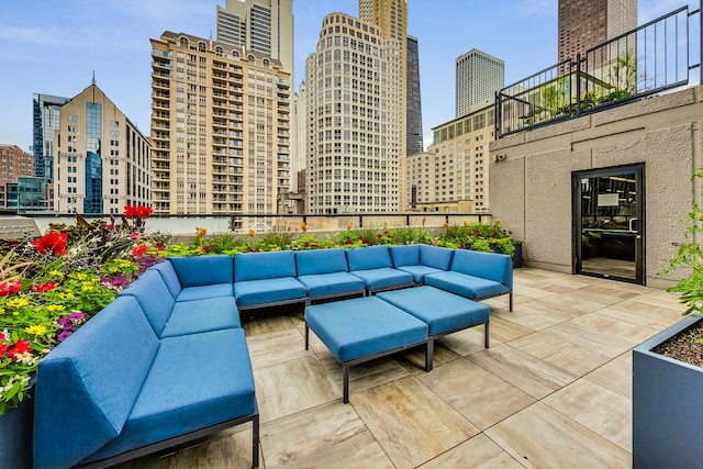 30 E Huron St Unit 2603, Chicago, IL 60611 - view of patio featuring an outdoor living space and a view of skyline