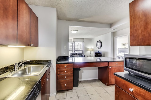30 E Huron St Unit 2603, Chicago, IL 60611 - kitchen featuring a textured ceiling, open floor plan, dark countertops, a peninsula, and light tile patterned flooring