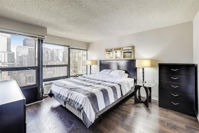 30 E Huron St Unit 2603, Chicago, IL 60611 - bedroom with wood finished floors, a textured ceiling, and a view of city