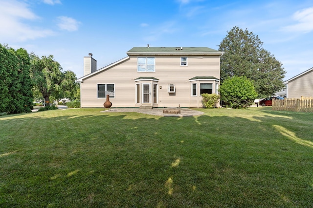 255 Ironbark Ct, Bolingbrook, IL 60440 - back of house featuring a chimney, a fire pit, and a patio area
