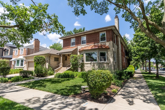 2900 W Birchwood Ave, Chicago, IL 60645 - view of front of home featuring a chimney, stone siding, a front yard, and a garage