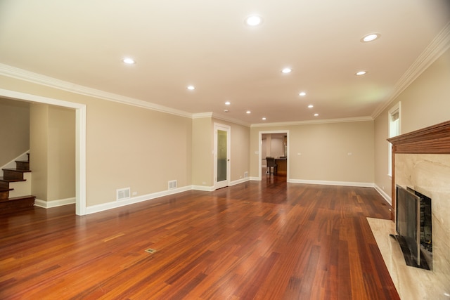 2900 W Birchwood Ave, Chicago, IL 60645 - unfurnished living room with recessed lighting, a fireplace, stairway, wood finished floors, and crown molding