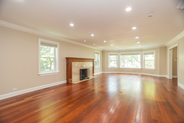 2900 W Birchwood Ave, Chicago, IL 60645 - unfurnished living room with hardwood / wood-style flooring, plenty of natural light, a high end fireplace, crown molding, and recessed lighting