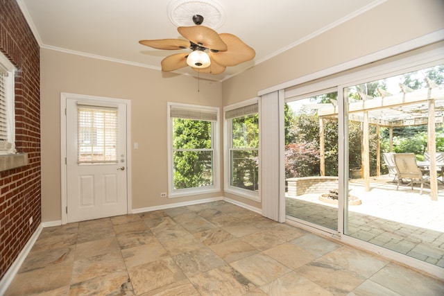 2900 W Birchwood Ave, Chicago, IL 60645 - unfurnished sunroom with stone tile flooring, ornamental molding, and brick wall