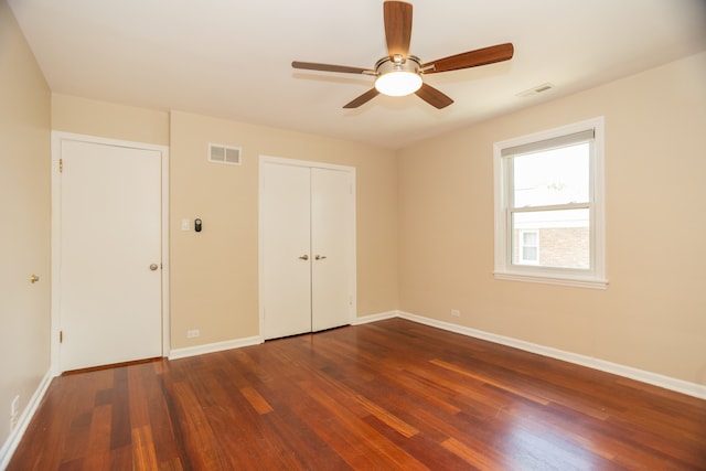2900 W Birchwood Ave, Chicago, IL 60645 - unfurnished bedroom featuring wood finished floors, a closet, and a ceiling fan