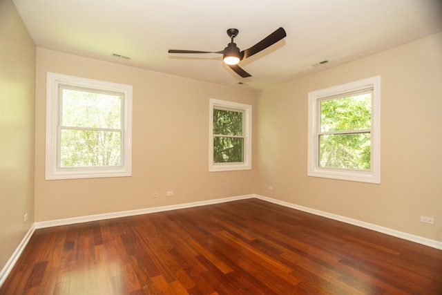 2900 W Birchwood Ave, Chicago, IL 60645 - empty room with dark wood finished floors and ceiling fan