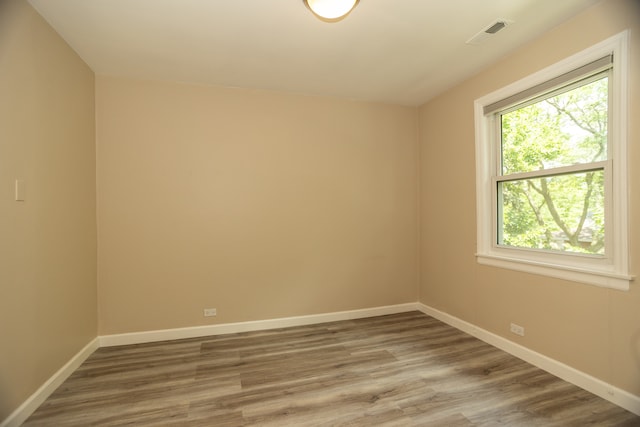 2900 W Birchwood Ave, Chicago, IL 60645 - unfurnished room with baseboards and wood finished floors