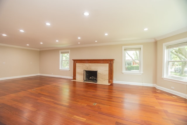 2900 W Birchwood Ave, Chicago, IL 60645 - unfurnished living room with plenty of natural light, ornamental molding, wood finished floors, a premium fireplace, and recessed lighting