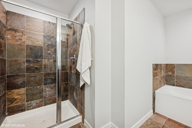 200 W Grand Ave Unit 1803, Chicago, IL 60654 - bathroom with a bath and a stall shower