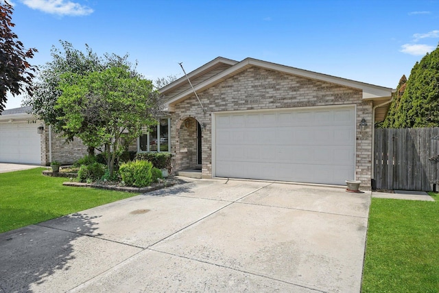 8410 S 78th Ave, Bridgeview, IL 60455 - ranch-style house with brick siding, driveway, and a garage