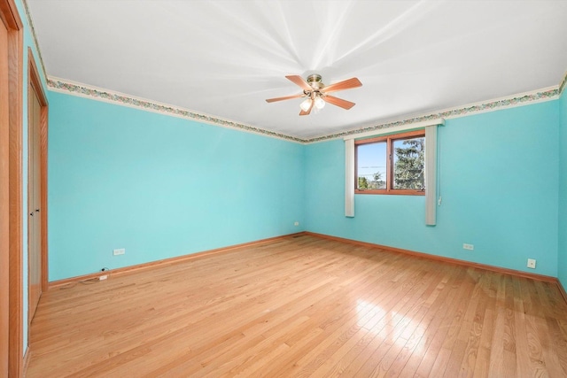 8410 S 78th Ave, Bridgeview, IL 60455 - spare room with ceiling fan and light wood finished floors