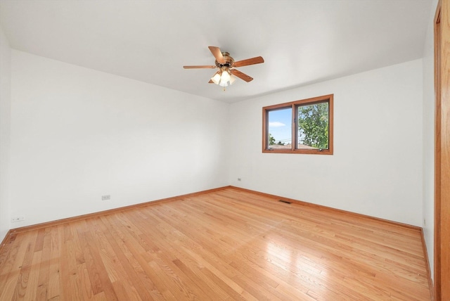 8410 S 78th Ave, Bridgeview, IL 60455 - empty room featuring light wood-style floors and ceiling fan