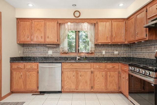 8410 S 78th Ave, Bridgeview, IL 60455 - kitchen featuring stainless steel appliances, backsplash, brown cabinetry, and light tile patterned floors