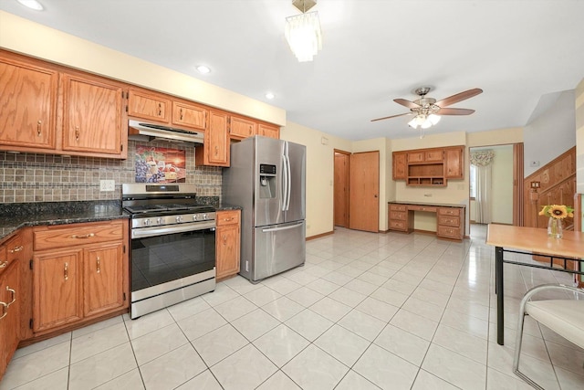8410 S 78th Ave, Bridgeview, IL 60455 - kitchen with appliances with stainless steel finishes, under cabinet range hood, tasteful backsplash, ceiling fan, and brown cabinets