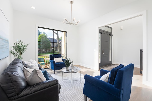 834 Wellner Rd, Naperville, IL 60540 - living area with a chandelier, light wood-style flooring, and recessed lighting