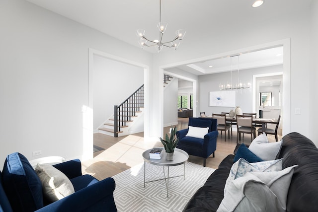 834 Wellner Rd, Naperville, IL 60540 - living area featuring a chandelier, stairs, recessed lighting, and light wood-style flooring