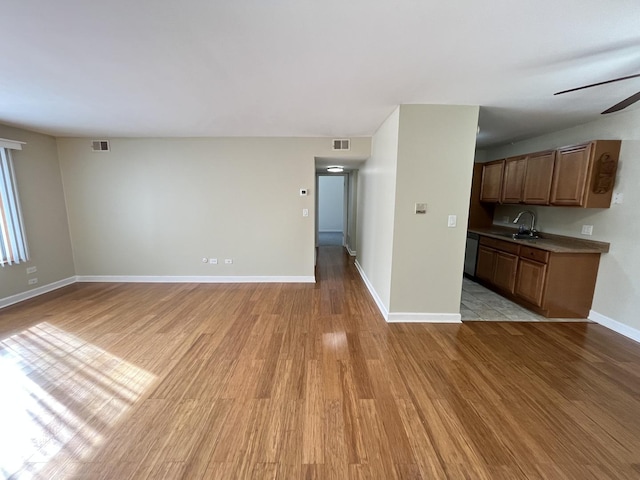 6156 Knoll Way Dr Unit 101, Willowbrook, IL 60527 - unfurnished living room featuring light wood finished floors and a ceiling fan