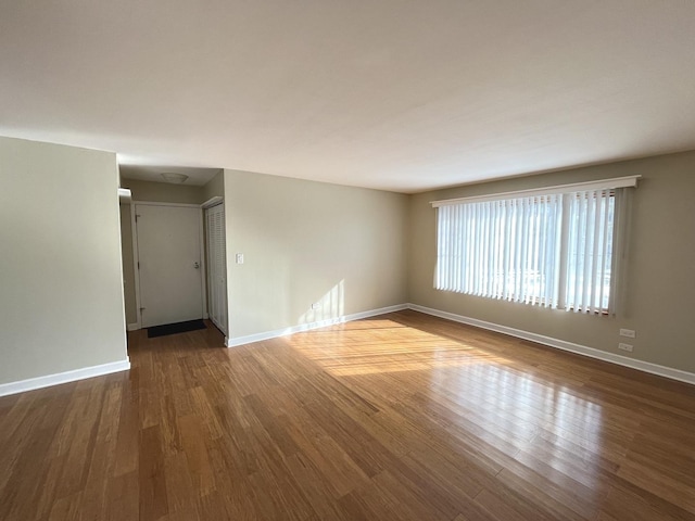 6156 Knoll Way Dr Unit 101, Willowbrook, IL 60527 - spare room featuring dark wood finished floors