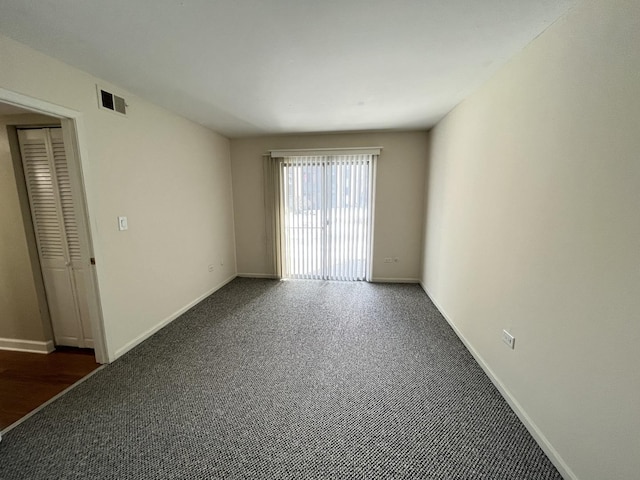 6156 Knoll Way Dr Unit 101, Willowbrook, IL 60527 - carpeted empty room featuring baseboards