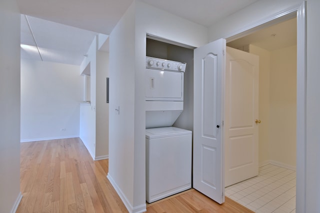 111 N Larch Ave Unit 206, Elmhurst, IL 60126 - corridor with stacked washing machine and dryer and light wood-style flooring