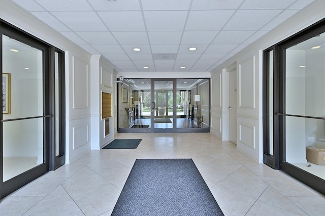 111 N Larch Ave Unit 206, Elmhurst, IL 60126 - community lobby featuring a decorative wall, a drop ceiling, recessed lighting, and wainscoting