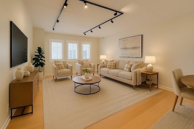 111 N Larch Ave Unit 206, Elmhurst, IL 60126 - living room featuring track lighting and light wood-style flooring