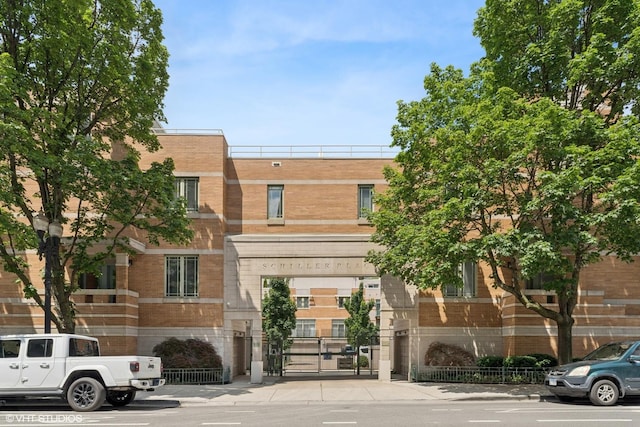 1401 N Wieland St Unit P, Chicago, IL 60610 - multi unit property featuring brick siding and a gate