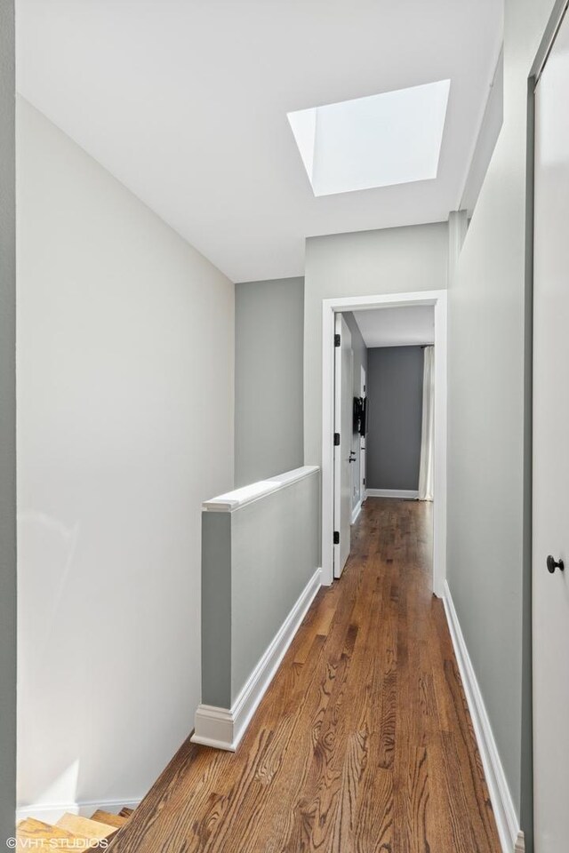 1401 N Wieland St Unit P, Chicago, IL 60610 - hall with a skylight, an upstairs landing, and wood finished floors