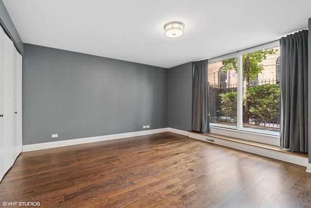 1401 N Wieland St Unit P, Chicago, IL 60610 - empty room featuring wood finished floors and baseboards