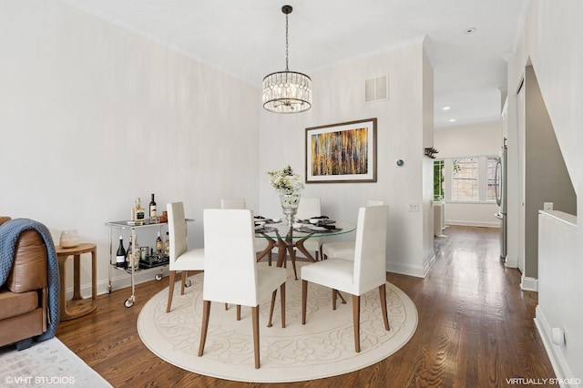 1401 N Wieland St Unit P, Chicago, IL 60610 - dining space featuring dark wood-style flooring and a chandelier