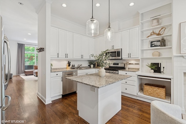 1401 N Wieland St Unit P, Chicago, IL 60610 - kitchen featuring appliances with stainless steel finishes, open shelves, white cabinets, a kitchen island, and recessed lighting